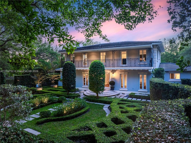 3916 Granada Blvd, Coral Gables, FL 33134 - view of front of property with french doors, a balcony, and stucco siding