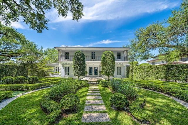 3916 Granada Blvd, Coral Gables, FL 33134 - view of front of property with french doors, a balcony, and stucco siding