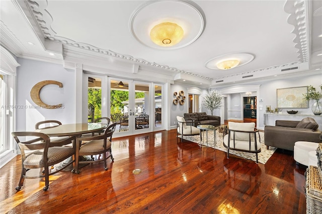 3916 Granada Blvd, Coral Gables, FL 33134 - living area with visible vents, crown molding, wood finished floors, a tray ceiling, and french doors