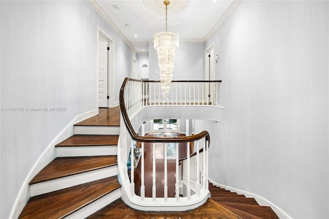 3916 Granada Blvd, Coral Gables, FL 33134 - staircase featuring a notable chandelier, crown molding, and baseboards