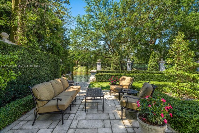 3916 Granada Blvd, Coral Gables, FL 33134 - view of patio featuring outdoor lounge area and fence