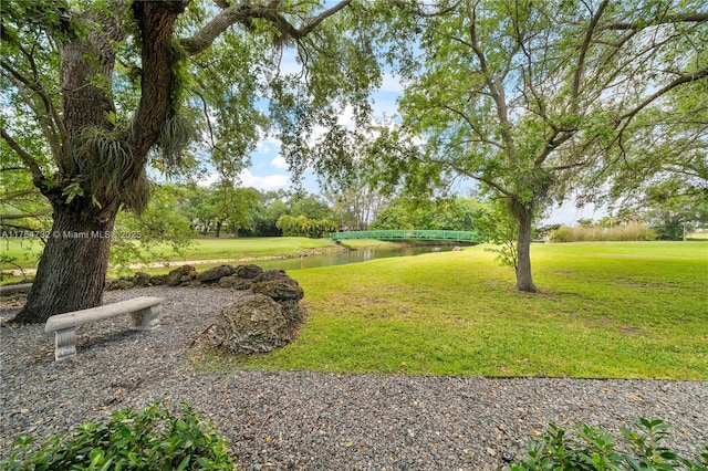 3916 Granada Blvd, Coral Gables, FL 33134 - view of property's community featuring a lawn and a water view