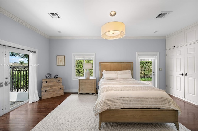 3916 Granada Blvd, Coral Gables, FL 33134 - bedroom with multiple windows, access to outside, and visible vents