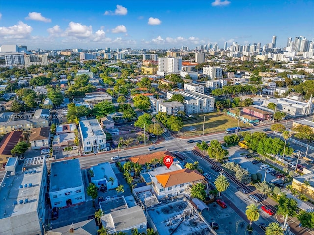 birds eye view of property featuring a view of city