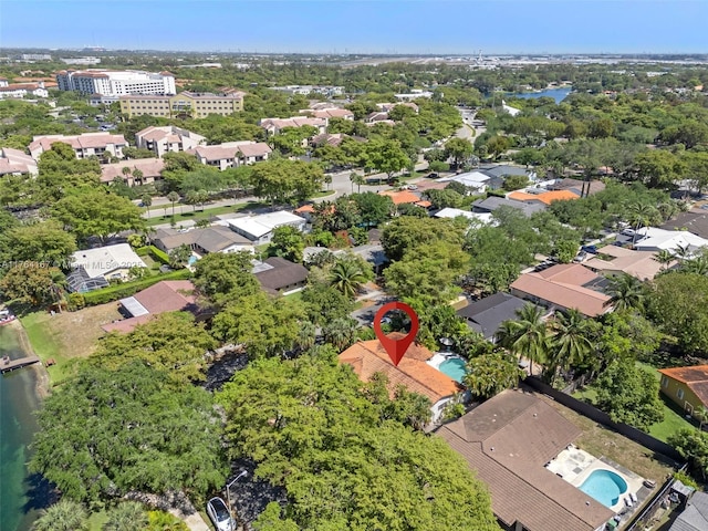 14841 Dade Pine Ave, Miami Lakes, FL 33014 - aerial view of a pool area, a large body of water, and a tree filled landscape