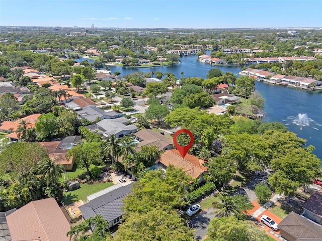 14841 Dade Pine Ave, Miami Lakes, FL 33014 - aerial perspective of suburban area with a nearby body of water