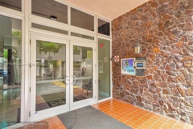 3161 S Ocean Dr Unit 708, Hallandale Beach, FL 33009 - entrance to property with stone siding and french doors