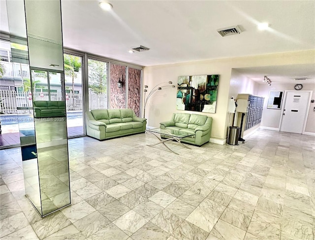 3161 S Ocean Dr Unit 708, Hallandale Beach, FL 33009 - living area featuring floor to ceiling windows, baseboards, and visible vents