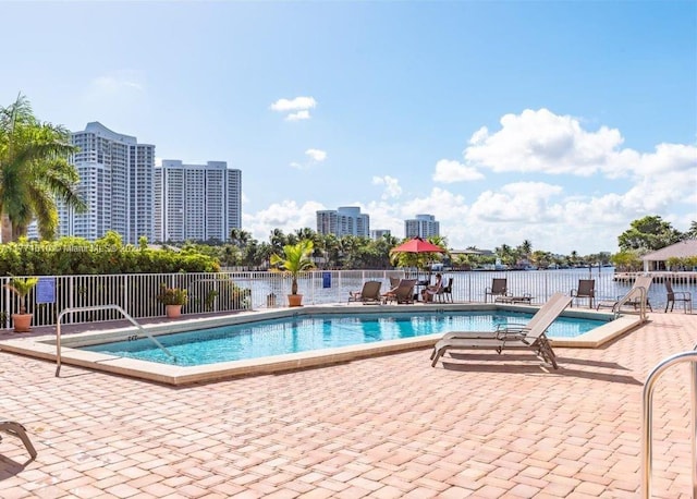 3161 S Ocean Dr Unit 708, Hallandale Beach, FL 33009 - pool with a patio, fence, and a city view