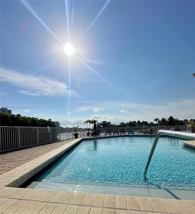 3161 S Ocean Dr Unit 708, Hallandale Beach, FL 33009 - community pool featuring fence and a patio