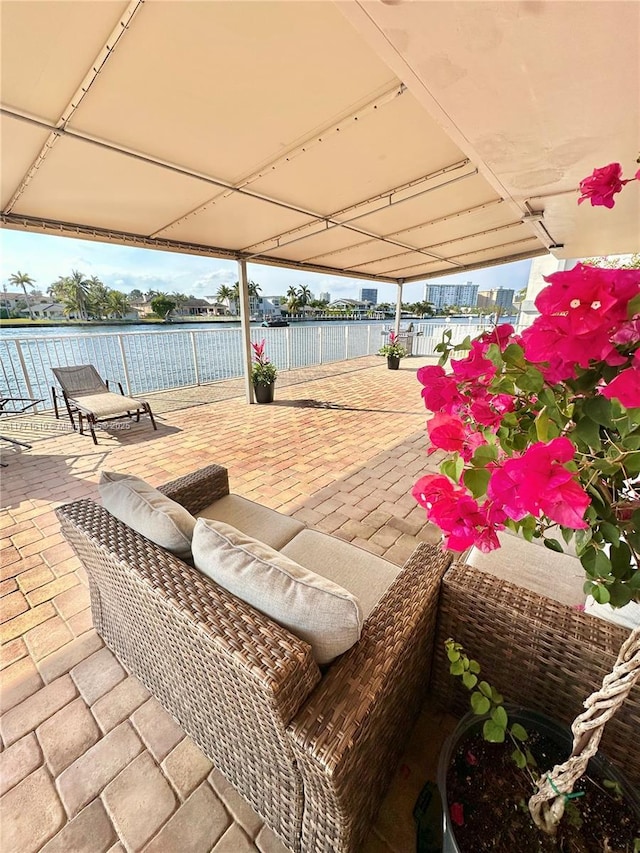 3161 S Ocean Dr Unit 708, Hallandale Beach, FL 33009 - view of patio featuring a water view and fence