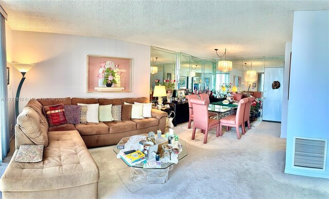 3161 S Ocean Dr Unit 708, Hallandale Beach, FL 33009 - carpeted living area featuring a textured ceiling and visible vents