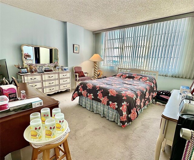 3161 S Ocean Dr Unit 708, Hallandale Beach, FL 33009 - bedroom featuring a textured ceiling and carpet