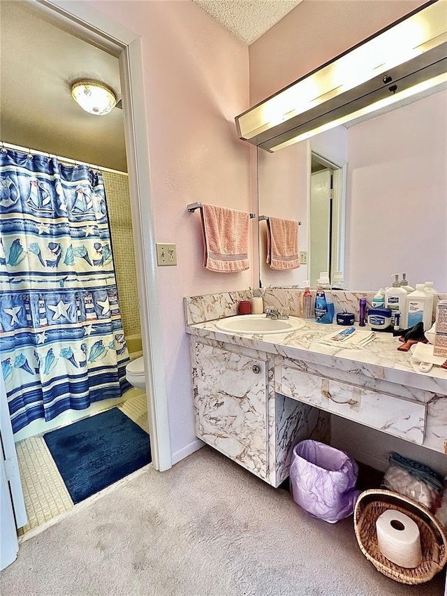 3161 S Ocean Dr Unit 708, Hallandale Beach, FL 33009 - bathroom featuring a textured ceiling, toilet, vanity, and a shower with curtain