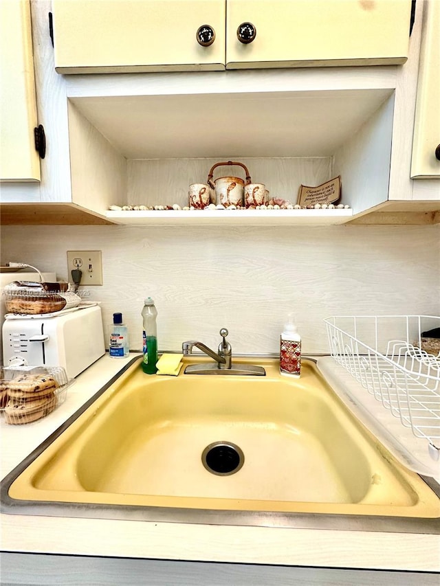 3161 S Ocean Dr Unit 708, Hallandale Beach, FL 33009 - details featuring light countertops, a sink, and open shelves
