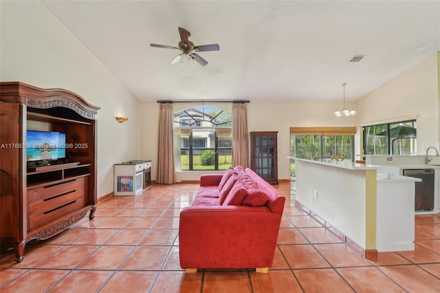 19460 NW 8th St, Pembroke Pines, FL 33029 - living room with lofted ceiling, light tile patterned floors, a chandelier, and ceiling fan