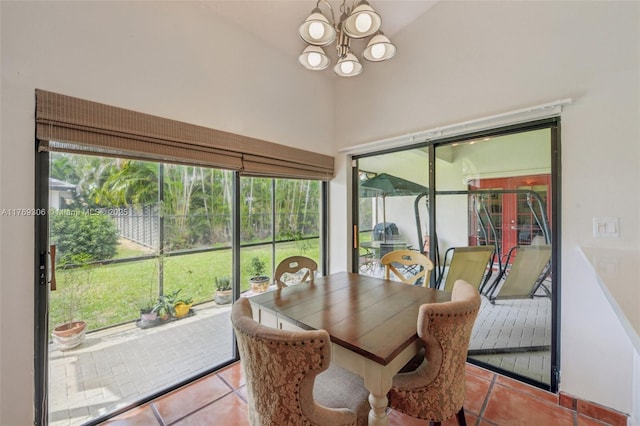 19460 NW 8th St, Pembroke Pines, FL 33029 - tiled dining space featuring a chandelier, high vaulted ceiling, and a sunroom