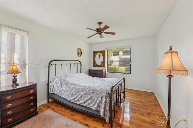 19460 NW 8th St, Pembroke Pines, FL 33029 - bedroom featuring wood finished floors, baseboards, and a ceiling fan