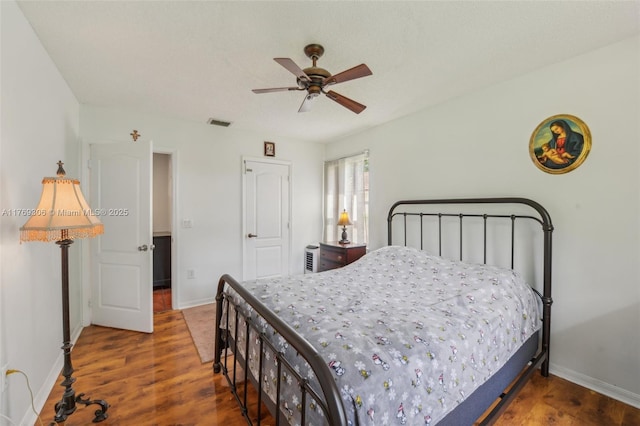 19460 NW 8th St, Pembroke Pines, FL 33029 - bedroom with baseboards, wood finished floors, and a ceiling fan