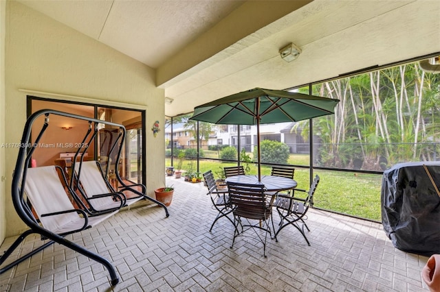 19460 NW 8th St, Pembroke Pines, FL 33029 - view of patio with area for grilling, glass enclosure, and outdoor dining space