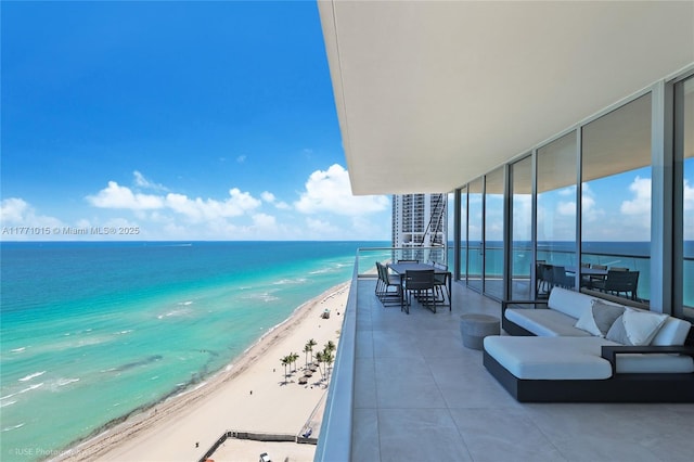 18501 Collins Ave Unit 1804, Sunny Isles Beach, FL 33160 - balcony with view of water and beach and an outdoor hangout area