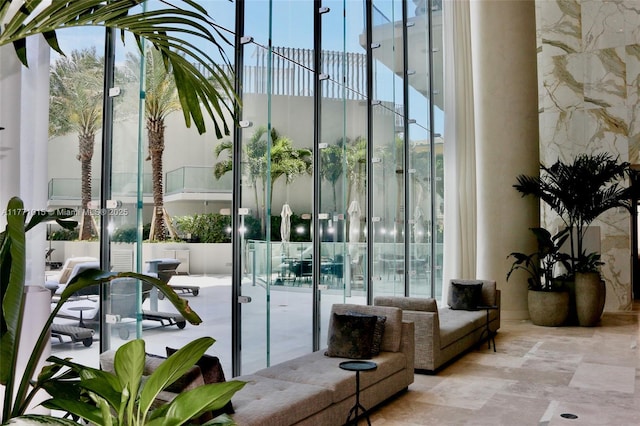 18501 Collins Ave Unit 1804, Sunny Isles Beach, FL 33160 - building lobby with a high ceiling and a wall of windows