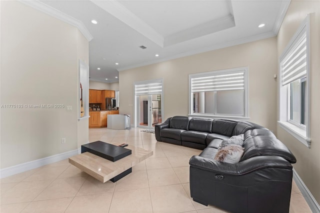 living room featuring light tile patterned floors, crown molding, recessed lighting, and baseboards