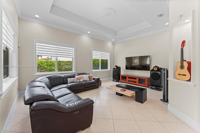 living area with crown molding, a raised ceiling, light tile patterned floors, baseboards, and recessed lighting