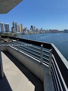 19101 NE Mystic Pointe Dr Unit 1601, Aventura, FL 33180 - balcony with a view of skyline and a water view
