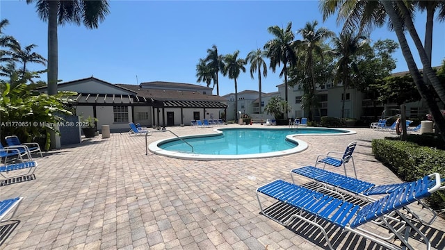 pool with a patio