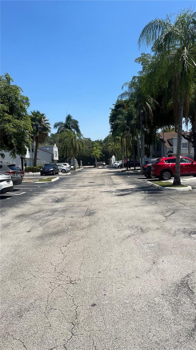 view of street featuring curbs