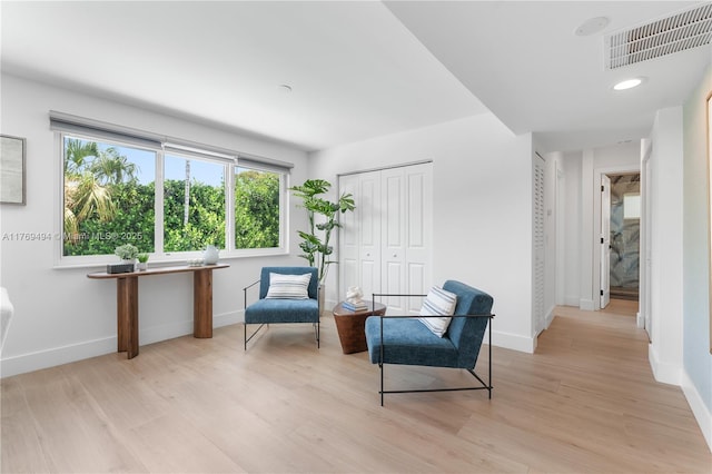 3291 SW 16th Ln, Miami, FL 33145 - living area featuring light wood-style floors and baseboards
