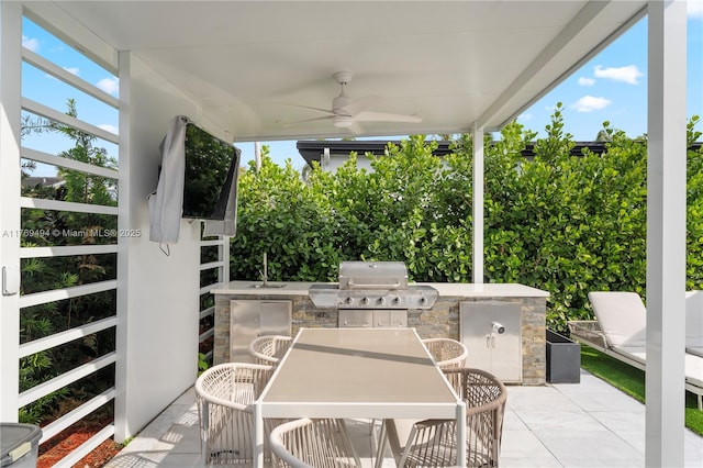 view of patio with a sink, grilling area, a ceiling fan, exterior kitchen, and outdoor dining space