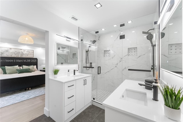 3291 SW 16th Ln, Miami, FL 33145 - full bathroom featuring ensuite bath, vanity, a marble finish shower, and wood finished floors