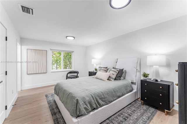 3291 SW 16th Ln, Miami, FL 33145 - bedroom with light wood-style flooring and baseboards