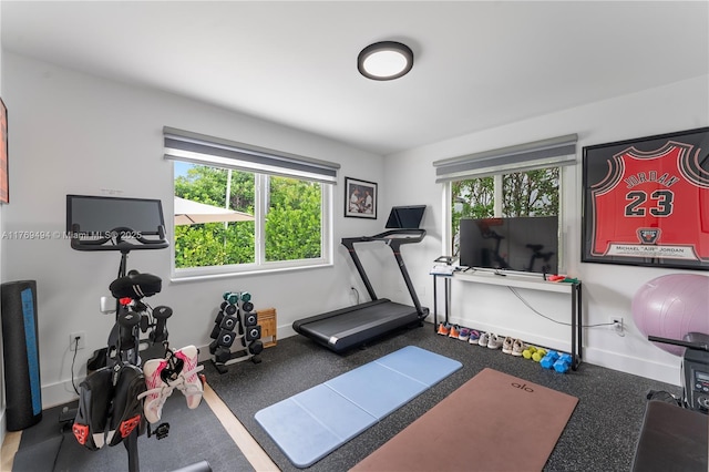 3291 SW 16th Ln, Miami, FL 33145 - workout room with baseboards