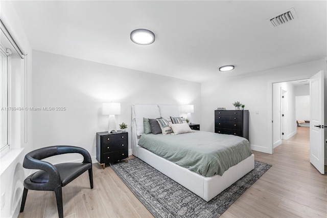 3291 SW 16th Ln, Miami, FL 33145 - bedroom featuring light wood-type flooring and baseboards