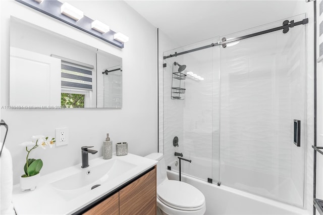 3291 SW 16th Ln, Miami, FL 33145 - bathroom featuring vanity, bath / shower combo with glass door, and toilet