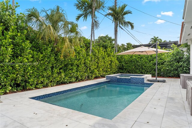 3291 SW 16th Ln, Miami, FL 33145 - mediterranean / spanish home featuring stucco siding, an attached garage, decorative driveway, and a tiled roof