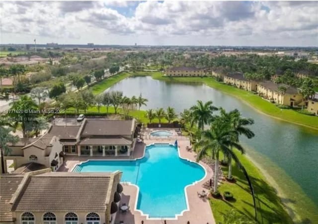 1650 NE 33rd Ave Unit 105-7, Homestead, FL 33033 - pool featuring a water view and a patio