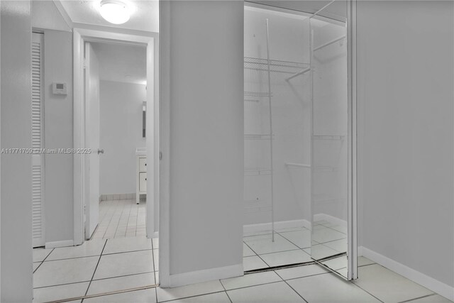 6711 N Kendall Dr Unit 510, Pinecrest, FL 33156 - bathroom with tile patterned floors and baseboards