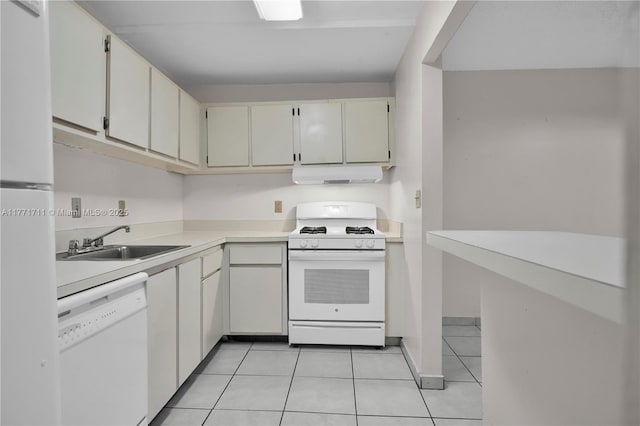 6886 N Kendall Dr Unit D208, Pinecrest, FL 33156 - kitchen with white appliances, under cabinet range hood, light tile patterned flooring, and light countertops