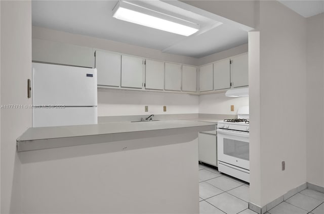 6886 N Kendall Dr Unit D208, Pinecrest, FL 33156 - kitchen featuring white appliances, under cabinet range hood, light tile patterned floors, and white cabinets
