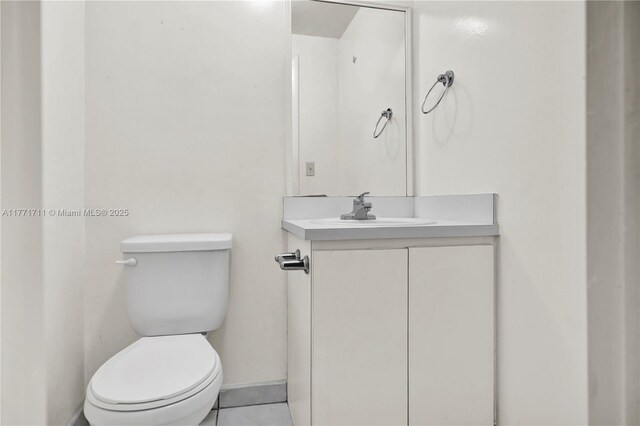 6886 N Kendall Dr Unit D208, Pinecrest, FL 33156 - half bathroom with vanity and tile patterned flooring