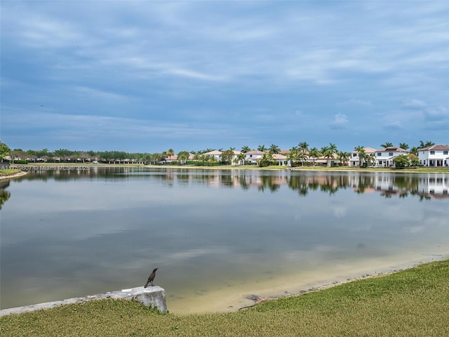 view of water feature with a residential view