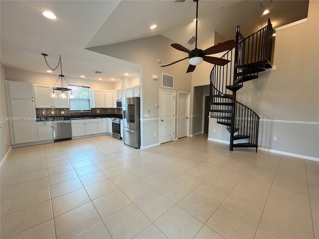 2907 Tortola Way, Cooper City, FL 33024 - unfurnished living room with stairs, ceiling fan, light tile patterned flooring, recessed lighting, and baseboards