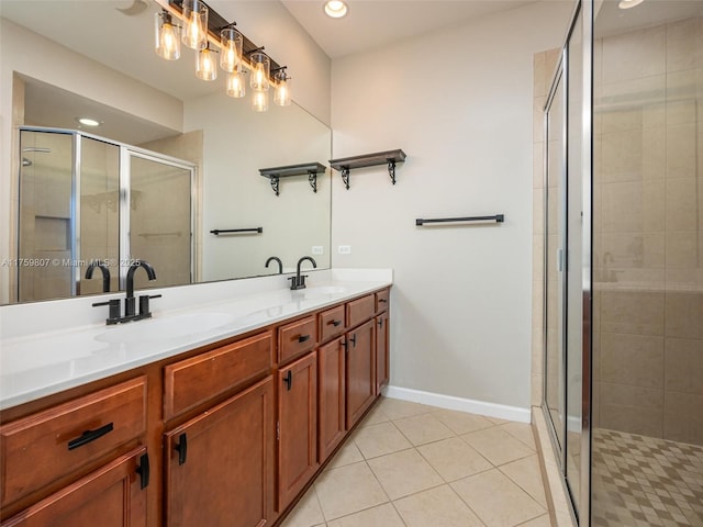 full bath with a sink, tile patterned floors, double vanity, and a stall shower