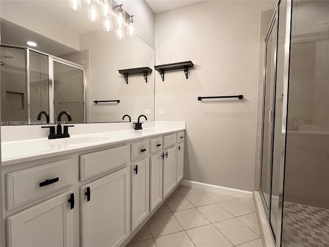 2907 Tortola Way, Cooper City, FL 33024 - full bathroom with double vanity, a shower stall, baseboards, and tile patterned floors