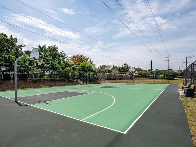 view of sport court with community basketball court and fence