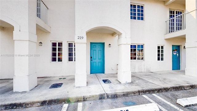 219 SW 6th Ln, Florida City, FL 33034 - doorway to property featuring stucco siding